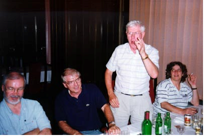Ron Dunkley addresses the orhestra, giving his next request. Accompanied by Larry Davidson (Canada), Ron Scoins (Canada) and Patricia Fauring (Argentina), Bulgaria, 1994