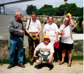 Under the giant Pearl River Estuary Bridge, Fumen, Guangdong Province, China. Standing: Peter Taylor (Australia), Petar Kenderov (Bulgaria), Alexander Soifer (USA), Nikolay Konstantinov (Russia). In front: Svetoslav Bilchev (Bulgaria), China, 1998.